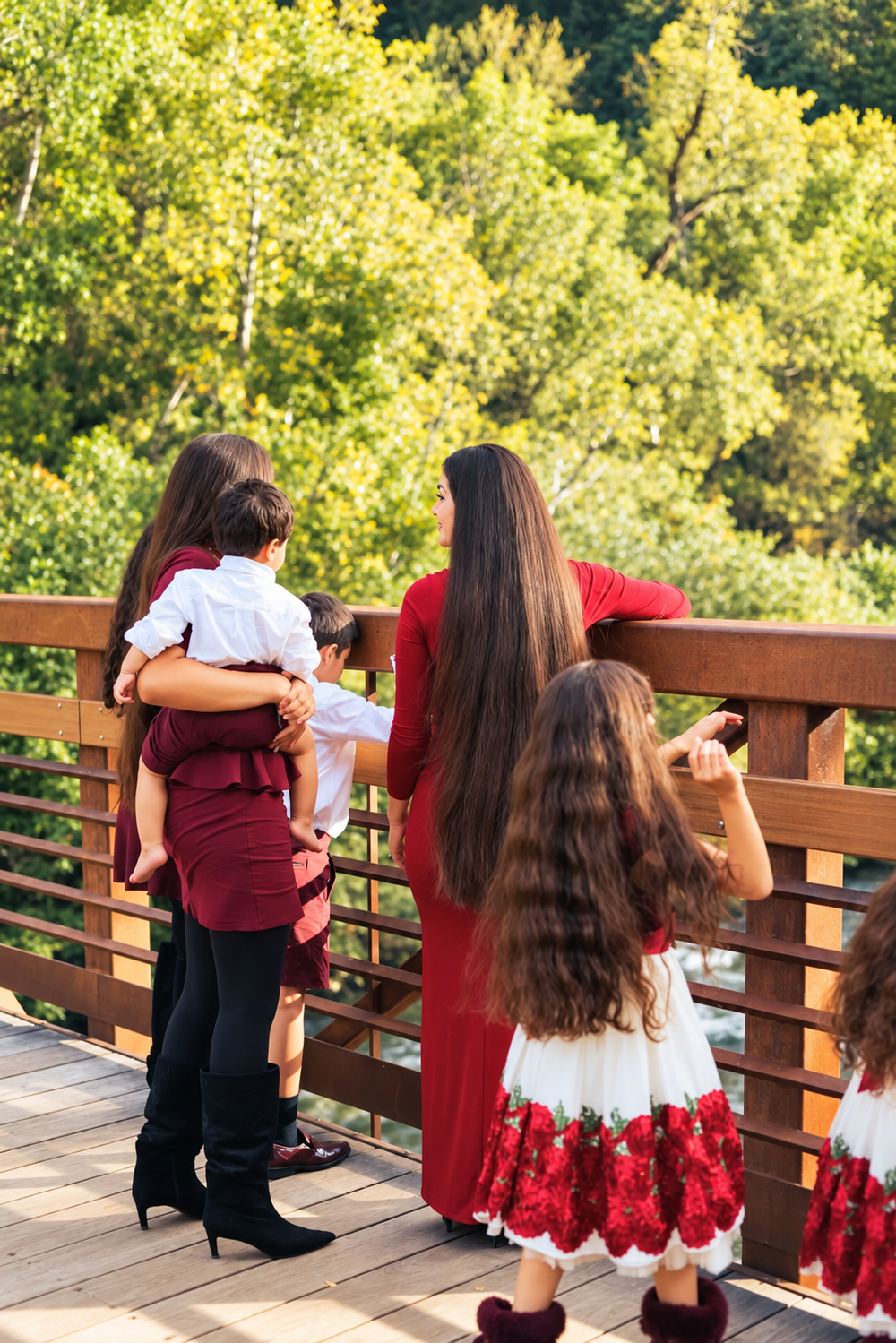 The Selva family on a wooden bridge, with brighter natural colors