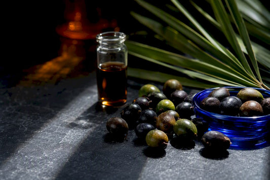 Saw palmetto berries beside botanical extract vial