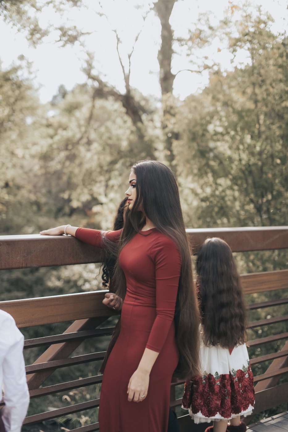 Long hair shown in a family portrait