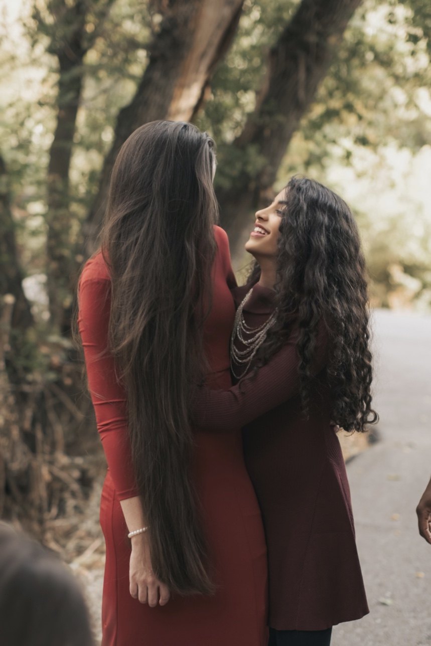 Long straight hair and natural curls in a family portrait